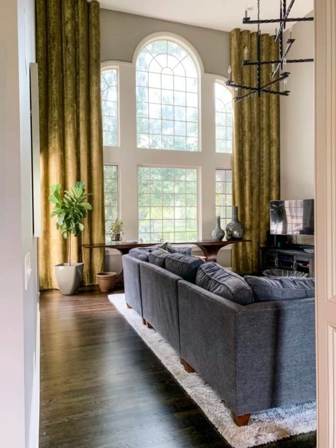 Contemporary chandelier over a dining table in a Daniel Home interior