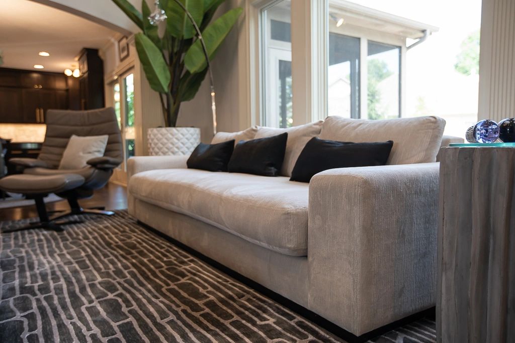 Styled living room by Daniel Home with layered textiles and original artwork